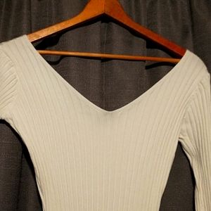 Off the shoulder white knit sweater dress.